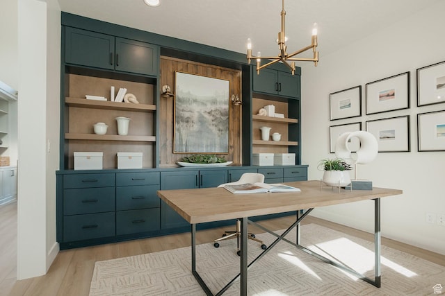 3488 E 1120 S Unit 115, Spanish Fork, UT 84660 - office area featuring a chandelier, light wood-type flooring, and built in shelves