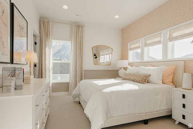 3488 E 1120 S Unit 115, Spanish Fork, UT 84660 - bedroom featuring multiple windows, light carpet, and recessed lighting