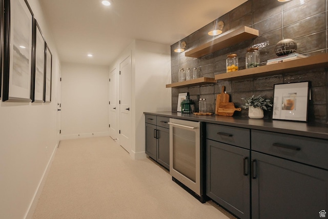 3488 E 1120 S Unit 115, Spanish Fork, UT 84660 - indoor dry bar featuring decorative backsplash, wine cooler, recessed lighting, and light colored carpet