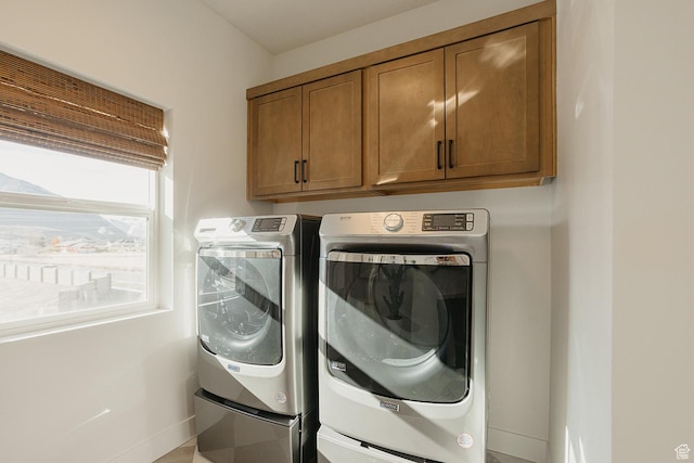 3488 E 1120 S Unit 115, Spanish Fork, UT 84660 - laundry room featuring cabinet space and washing machine and clothes dryer