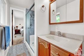 1708 Hislop Dr, Ogden, UT 84404 - bathroom with vanity, a shower stall, and ensuite bathroom