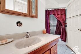 1708 Hislop Dr, Ogden, UT 84404 - bathroom with vanity, tile patterned floors, and a shower with shower curtain