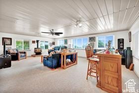 1708 Hislop Dr, Ogden, UT 84404 - living area with a ceiling fan