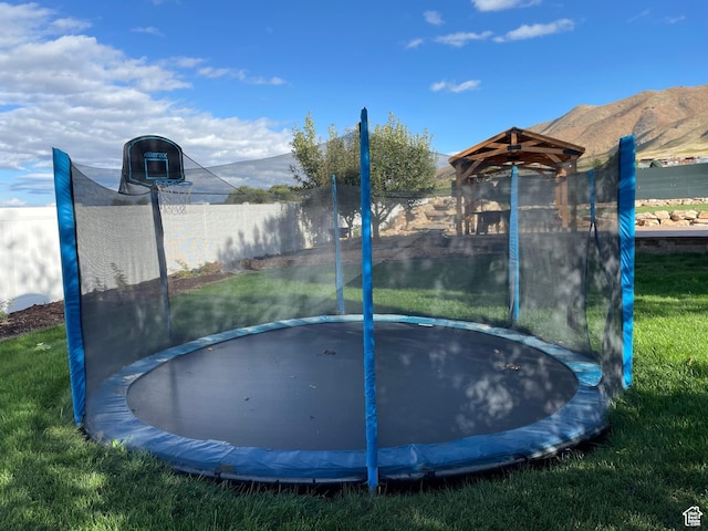 70 W 1790 N, Genola, UT 84655 - surrounding community with a trampoline and a mountain view