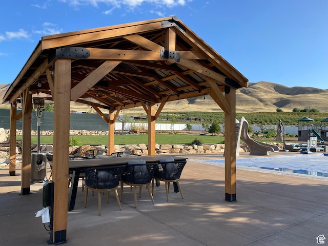 70 W 1790 N, Genola, UT 84655 - view of home's community with a patio, a swimming pool, outdoor dining area, and a gazebo