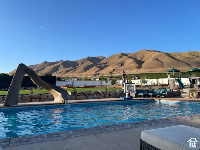 70 W 1790 N, Genola, UT 84655 - community pool with a water slide and a mountain view