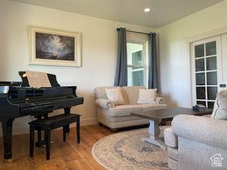 70 W 1790 N, Genola, UT 84655 - living room featuring light wood-type flooring and recessed lighting