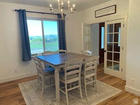 70 W 1790 N, Genola, UT 84655 - dining space featuring a chandelier and wood finished floors