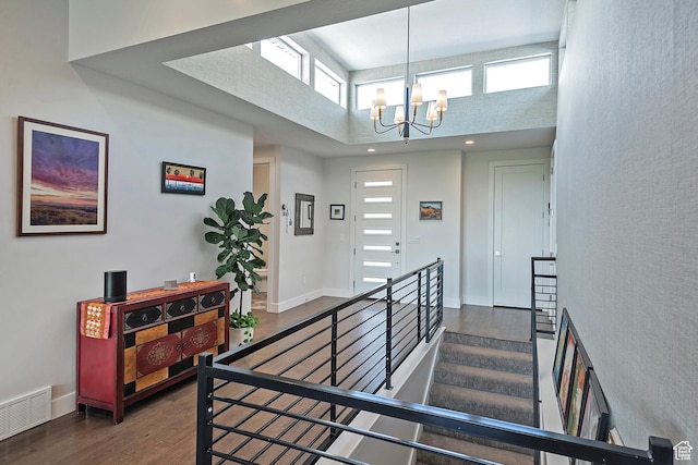 68 E Columbus Ct, Salt Lake City, UT 84103 - stairs featuring a high ceiling, a chandelier, and wood finished floors