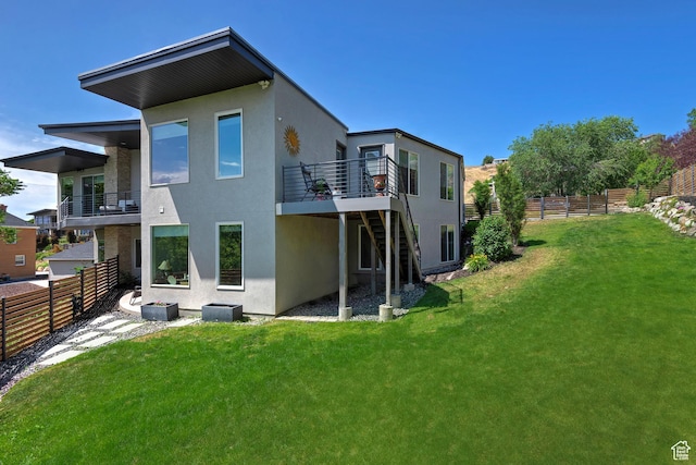 68 E Columbus Ct, Salt Lake City, UT 84103 - rear view of house with stucco siding, stairway, a fenced backyard, and a wooden deck