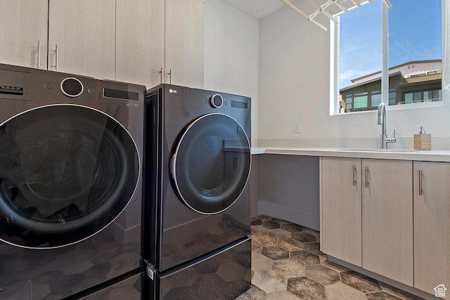 68 E Columbus Ct, Salt Lake City, UT 84103 - washroom with cabinet space, independent washer and dryer, and stone finish flooring