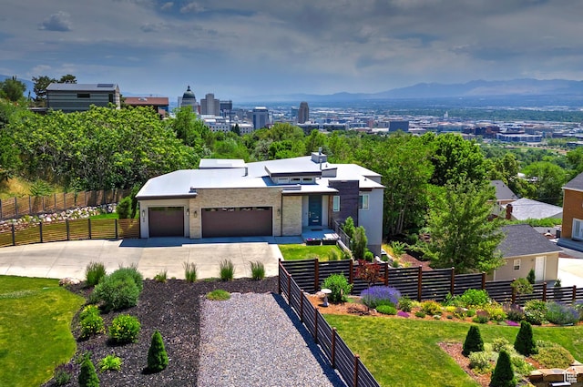 68 E Columbus Ct, Salt Lake City, UT 84103 - contemporary home featuring driveway, a garage, and stucco siding