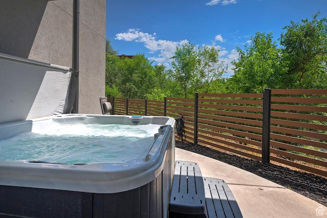 68 E Columbus Ct, Salt Lake City, UT 84103 - view of patio with a hot tub