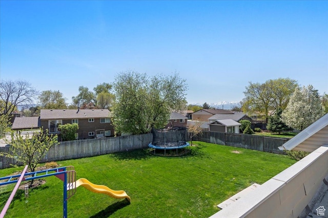 282 E 9545 S, Sandy, UT 84070 - fenced backyard with a trampoline, a playground, and a residential view