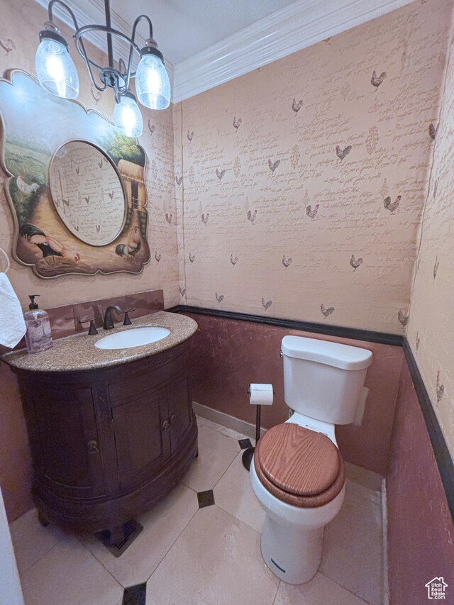 289 W Count Fleet Rd, St George, UT 84790 - bathroom featuring vanity, crown molding, tile patterned floors, and wallpapered walls