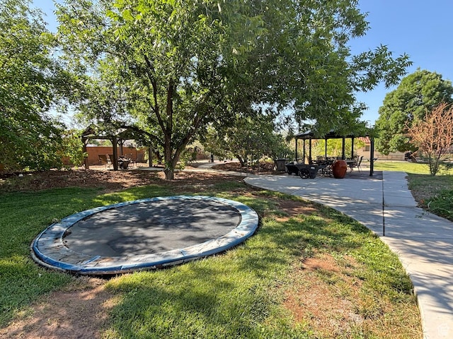 289 W Count Fleet Rd, St George, UT 84790 - view of property's community with a trampoline, a gazebo, and a lawn