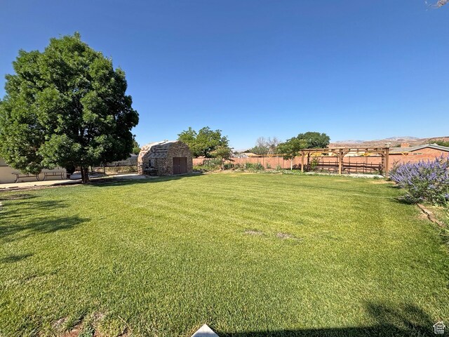 289 W Count Fleet Rd, St George, UT 84790 - fenced backyard with a storage shed