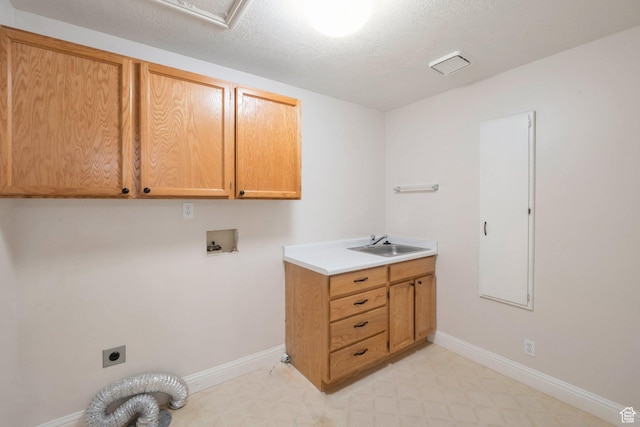 335 W 1410 S, Orem, UT 84058 - washroom featuring hookup for an electric dryer, cabinet space, light flooring, and hookup for a washing machine