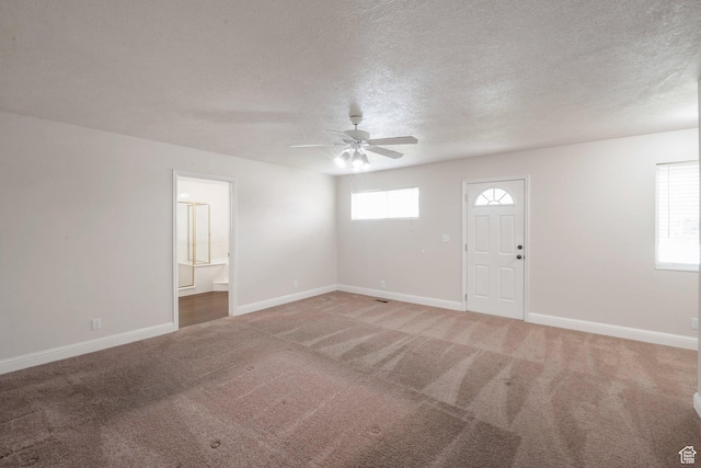 335 W 1410 S, Orem, UT 84058 - entrance foyer with a ceiling fan, light carpet, and a textured ceiling