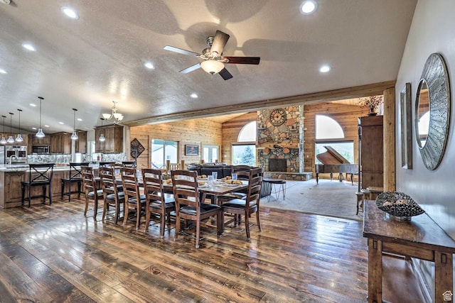 3572 Wild Mare Way, Heber City, UT 84032 - dining space with vaulted ceiling, dark wood-style floors, wood walls, a ceiling fan, and recessed lighting