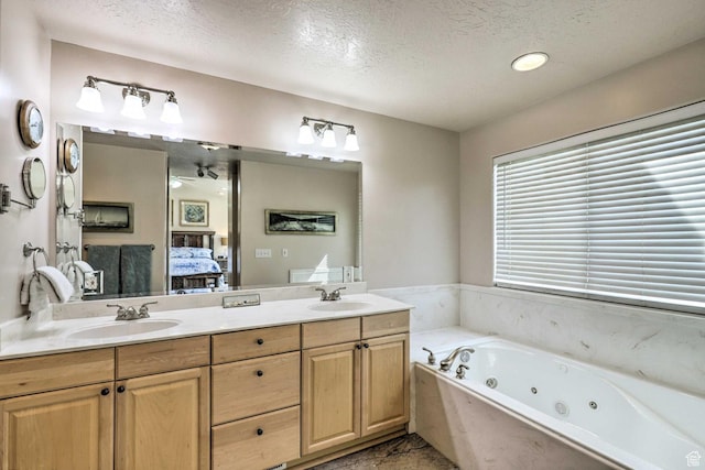 3572 Wild Mare Way, Heber City, UT 84032 - ensuite bathroom featuring a textured ceiling, double vanity, and a tub with jets
