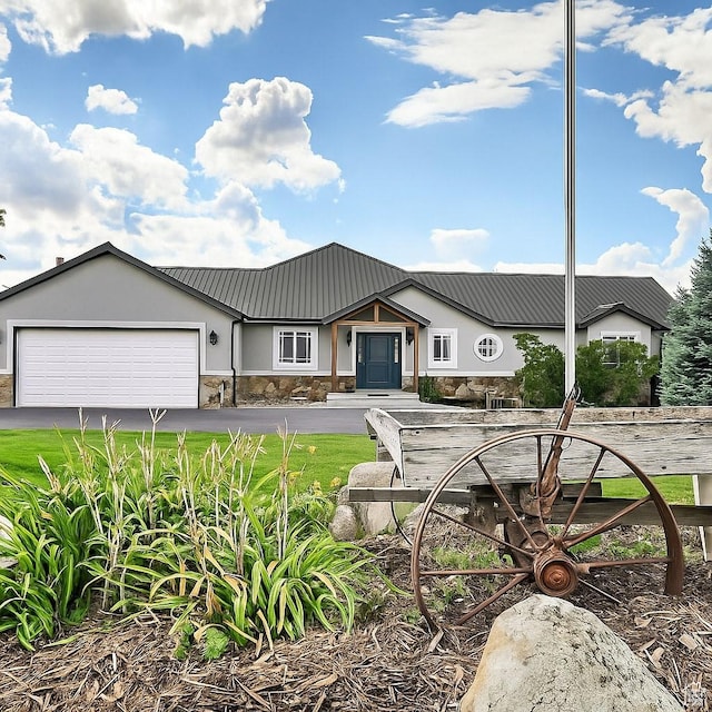 3572 Wild Mare Way, Heber City, UT 84032 - view of front of property with stone siding, an attached garage, driveway, and stucco siding