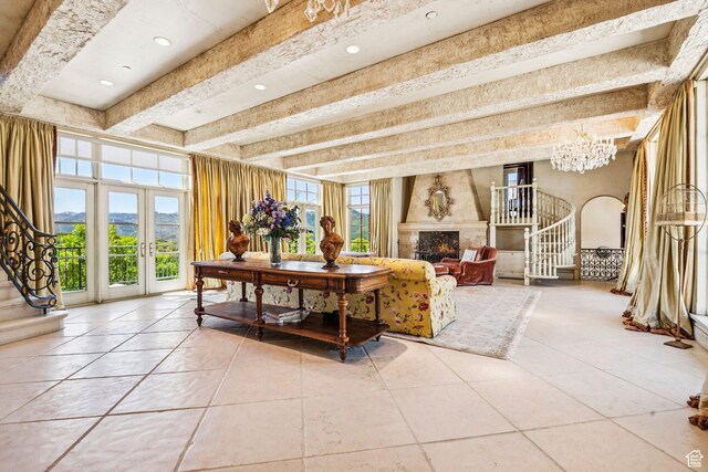 1526 W Red Hawk Trl, Park City, UT 84098 - living room with stairs, light tile patterned flooring, beamed ceiling, a premium fireplace, and a chandelier