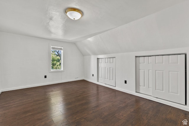 165 N 800 E, Hyrum, UT 84319 - additional living space featuring vaulted ceiling and dark wood-type flooring