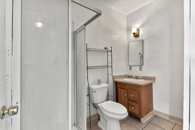 165 N 800 E, Hyrum, UT 84319 - full bathroom with vanity, tile patterned flooring, a shower stall, and a textured wall
