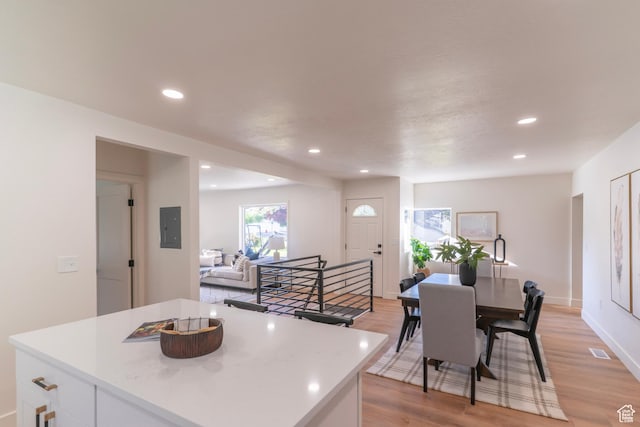 170 S 1300 E, Springville, UT 84663 - kitchen with light countertops, recessed lighting, white cabinetry, light wood-style flooring, and electric panel