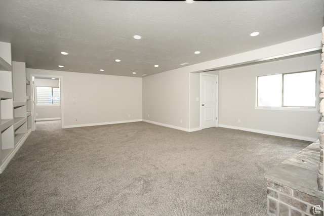 1103 Vista Dr, Santaquin, UT 84655 - unfurnished living room with recessed lighting, carpet, and a textured ceiling
