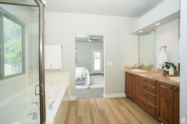 1103 Vista Dr, Santaquin, UT 84655 - ensuite bathroom with a garden tub, double vanity, wood finished floors, and ceiling fan