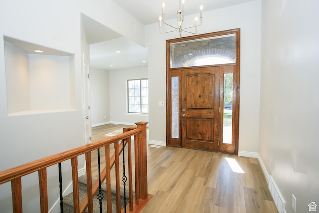 1103 Vista Dr, Santaquin, UT 84655 - foyer entrance featuring light wood-style floors, a chandelier, and recessed lighting