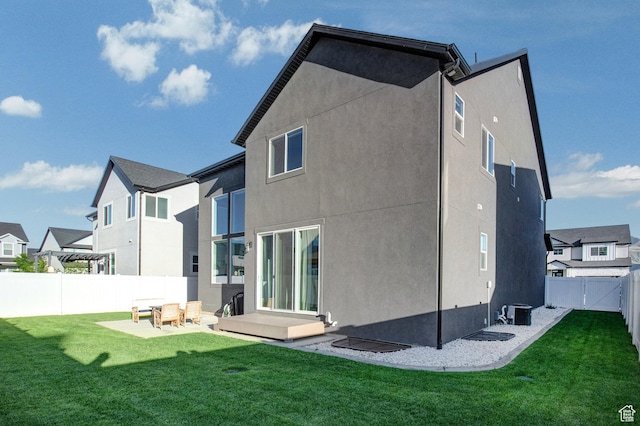 1476 W Stone Gate Dr, Saratoga Springs, UT 84045 - back of house featuring a fenced backyard, stucco siding, and a residential view