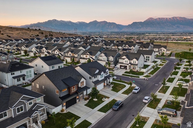 1476 W Stone Gate Dr, Saratoga Springs, UT 84045 - aerial view at dusk of a mountain view and a residential view