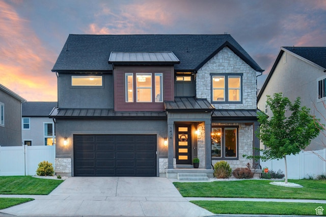 1476 W Stone Gate Dr, Saratoga Springs, UT 84045 - view of front facade featuring a standing seam roof, stone siding, a garage, and concrete driveway