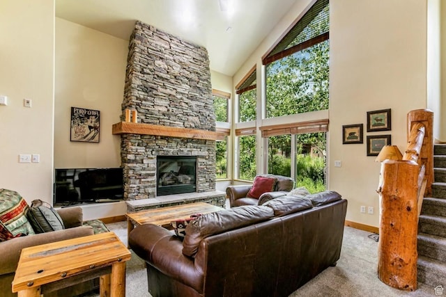 8437 Pointe Dr, Park City, UT 84098 - carpeted living area with high vaulted ceiling, a stone fireplace, and stairs