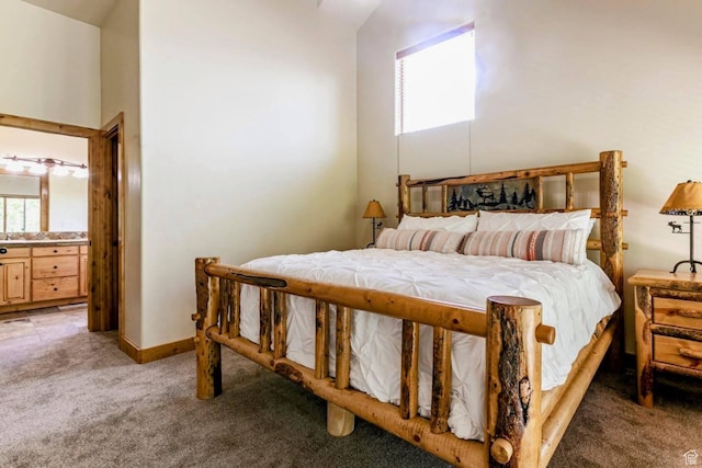 8437 Pointe Dr, Park City, UT 84098 - bedroom featuring light colored carpet, a towering ceiling, and ensuite bathroom