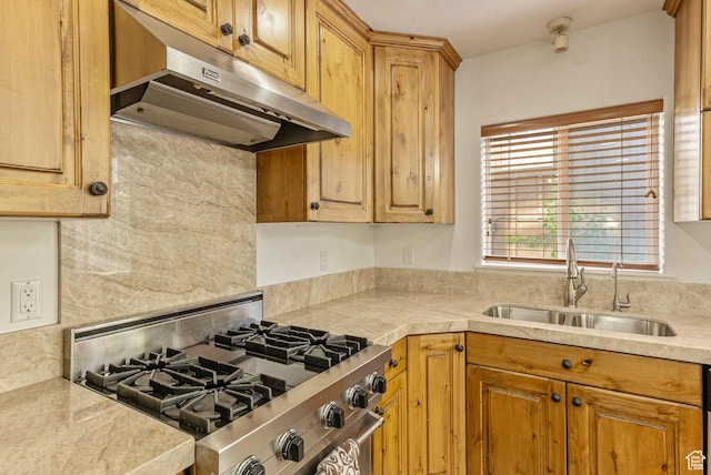 5150 Cove Canyon Dr Unit A, Park City, UT 84098 - kitchen featuring gas range, under cabinet range hood, light countertops, and tasteful backsplash