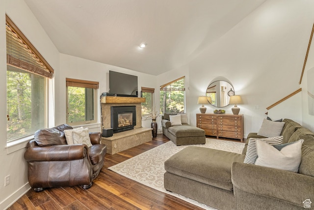 5150 Cove Canyon Dr Unit A, Park City, UT 84098 - living room with plenty of natural light, wood finished floors, a glass covered fireplace, and vaulted ceiling
