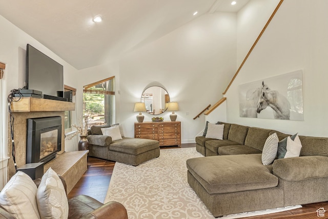 5150 Cove Canyon Dr Unit A, Park City, UT 84098 - living room with wood finished floors, vaulted ceiling, a glass covered fireplace, recessed lighting, and stairway