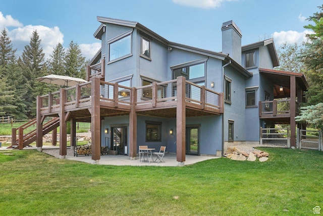 2570 Aspen Springs Dr, Park City, UT 84060 - back of property with a chimney, stucco siding, and stairway