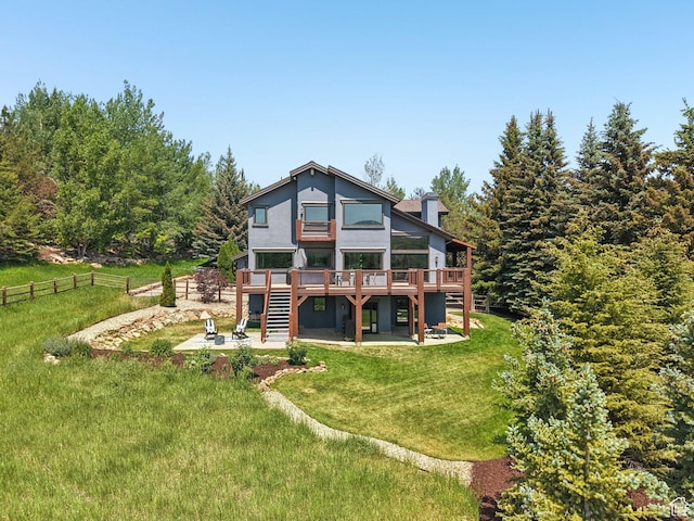 2570 Aspen Springs Dr, Park City, UT 84060 - rear view of property with a deck, a patio, stairs, and a chimney