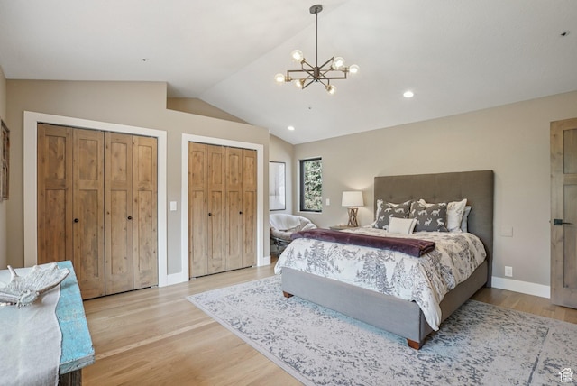 2570 Aspen Springs Dr, Park City, UT 84060 - bedroom featuring lofted ceiling, two closets, light wood-type flooring, a chandelier, and recessed lighting