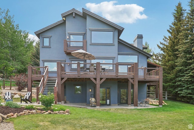 2570 Aspen Springs Dr, Park City, UT 84060 - rear view of house featuring a patio area, a deck, stairway, and stucco siding
