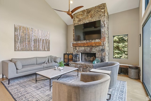 2570 Aspen Springs Dr, Park City, UT 84060 - living room with high vaulted ceiling, wood finished floors, a fireplace, and ceiling fan