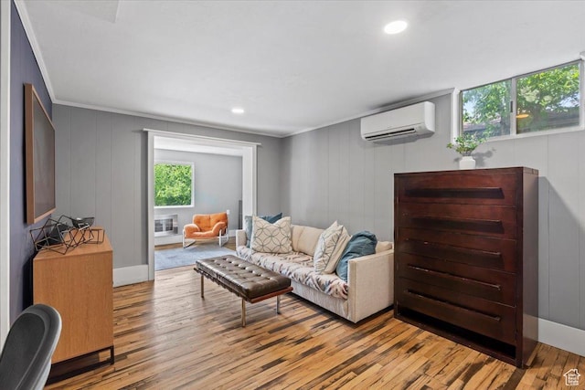 4560 S Wallace Ln, Holladay, UT 84117 - living area featuring an AC wall unit, healthy amount of natural light, crown molding, light wood finished floors, and a decorative wall