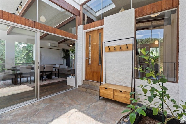 4560 S Wallace Ln, Holladay, UT 84117 - view of exterior entry featuring outdoor dining space and a wall unit AC