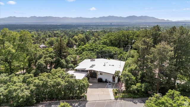 4560 S Wallace Ln, Holladay, UT 84117 - view from above of property featuring a mountain backdrop and a heavily wooded area