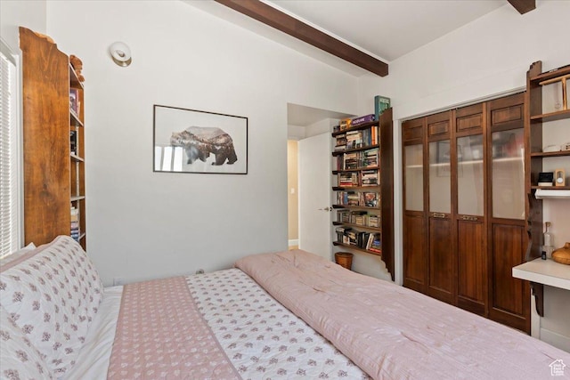 4560 S Wallace Ln, Holladay, UT 84117 - bedroom with beamed ceiling and a closet
